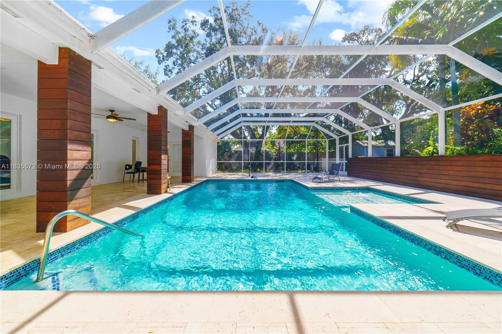 Welcome to this beautifully updated 4 bedroom two master bedrooms each with direct access to the pool area, 3 bathroom home boasting 2, 875 sqft !