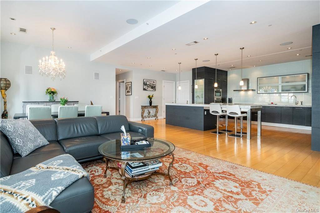 Amazing top floor three bedroom, two and a half bath condo with great water views !