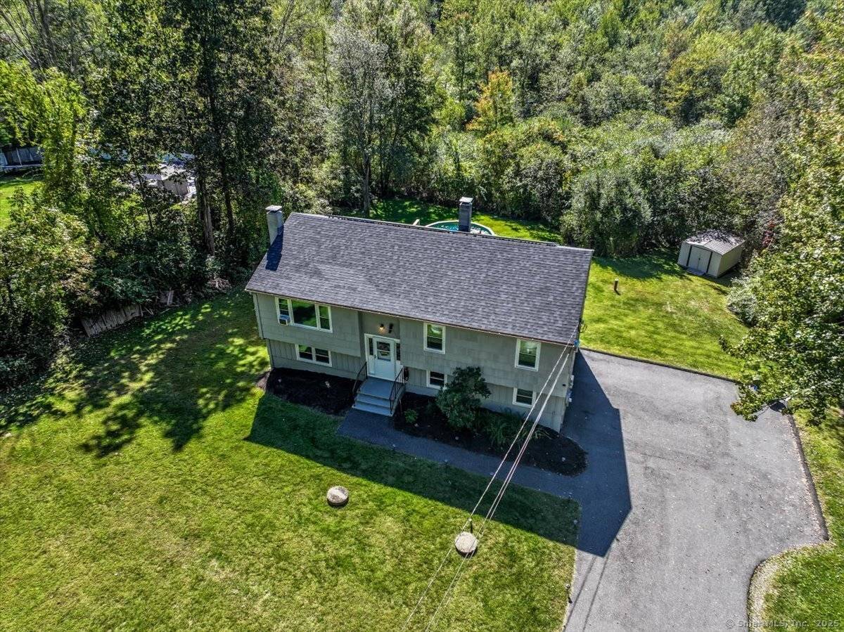 Beautiful Raised Ranch, perfectly situated on a spacious 0.