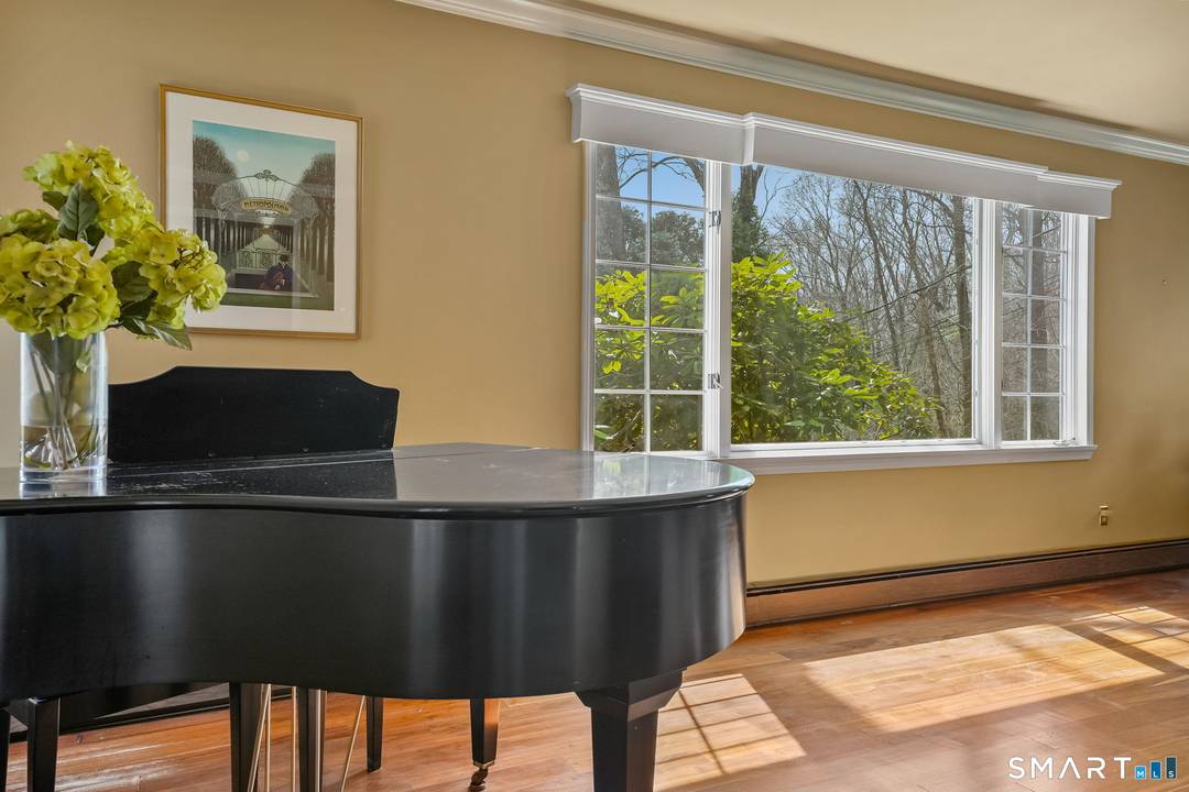 Set back from the street and introduced by a brick entry with space to sit and unwind, this expansive, first time offered Colonial reflects a level of craftsmanship and scale ...