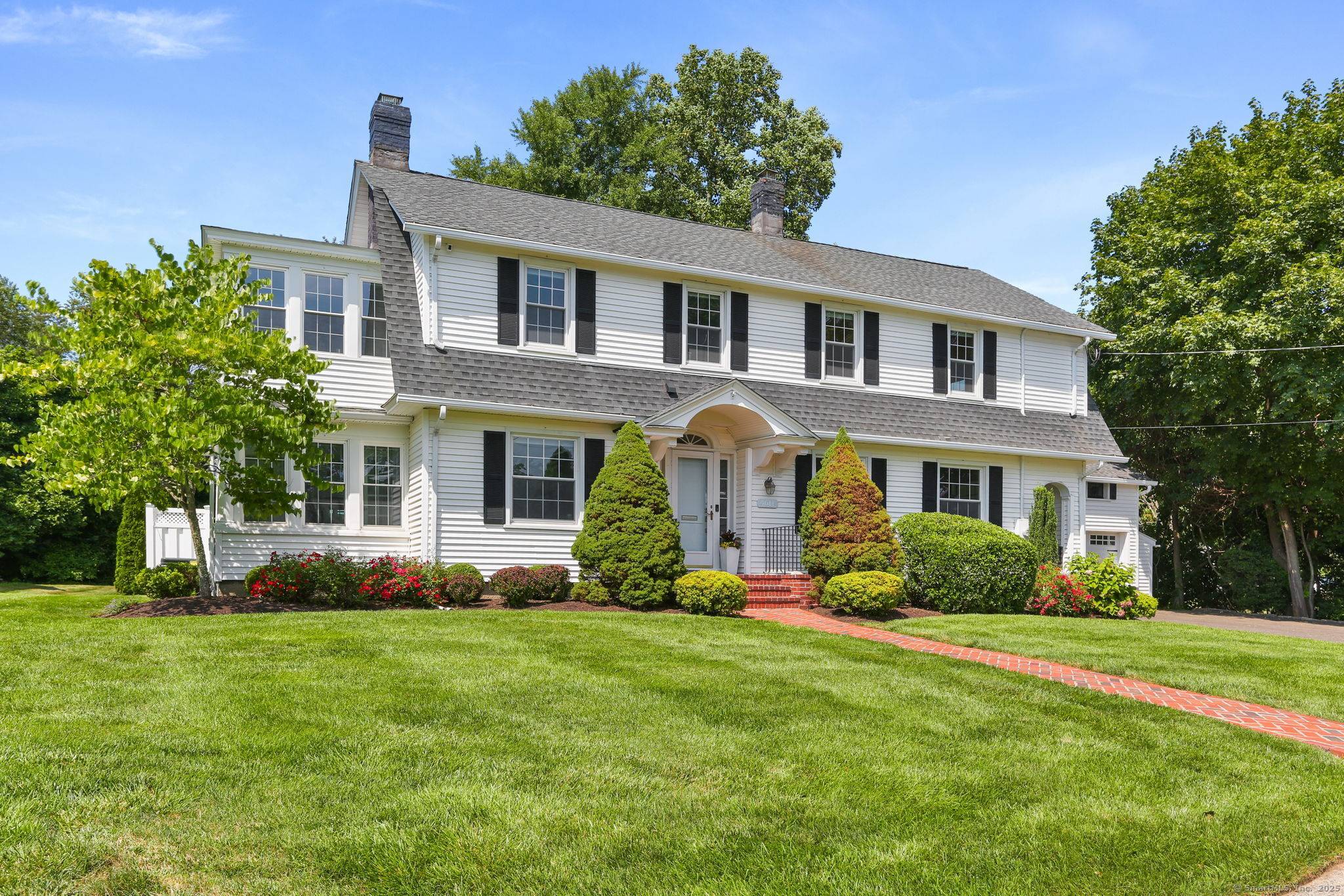 This classic updated 1920s Colonial has four bedroom, two and a half bath.