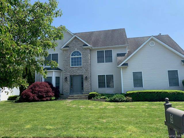 Spacious 5 Bedroom Home on Private Cul de Sac in Harborfields School District Welcome to this exceptional single family residence, ideally located on a private cul de sac within the ...