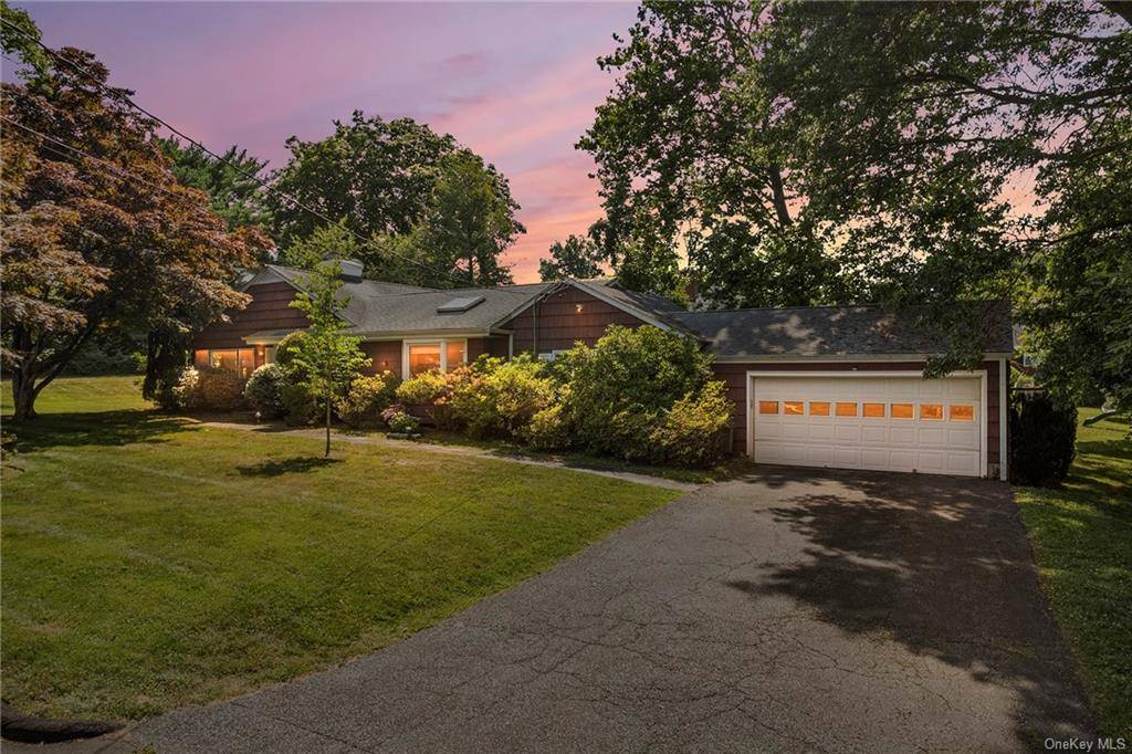 Welcome home to 14 Old Orchard Rd located on a gorgeous corner lot of park like property in the desirable Pine Ridge area.