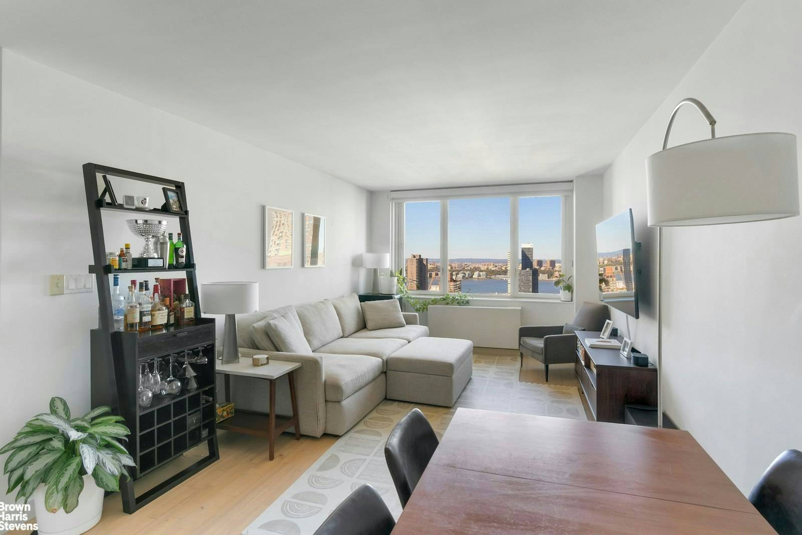 River View Residence at The Sheffield Welcome to this stunning 2 bedroom, 2 bath residence at The Sheffield, where every room offers sweeping river and city views.