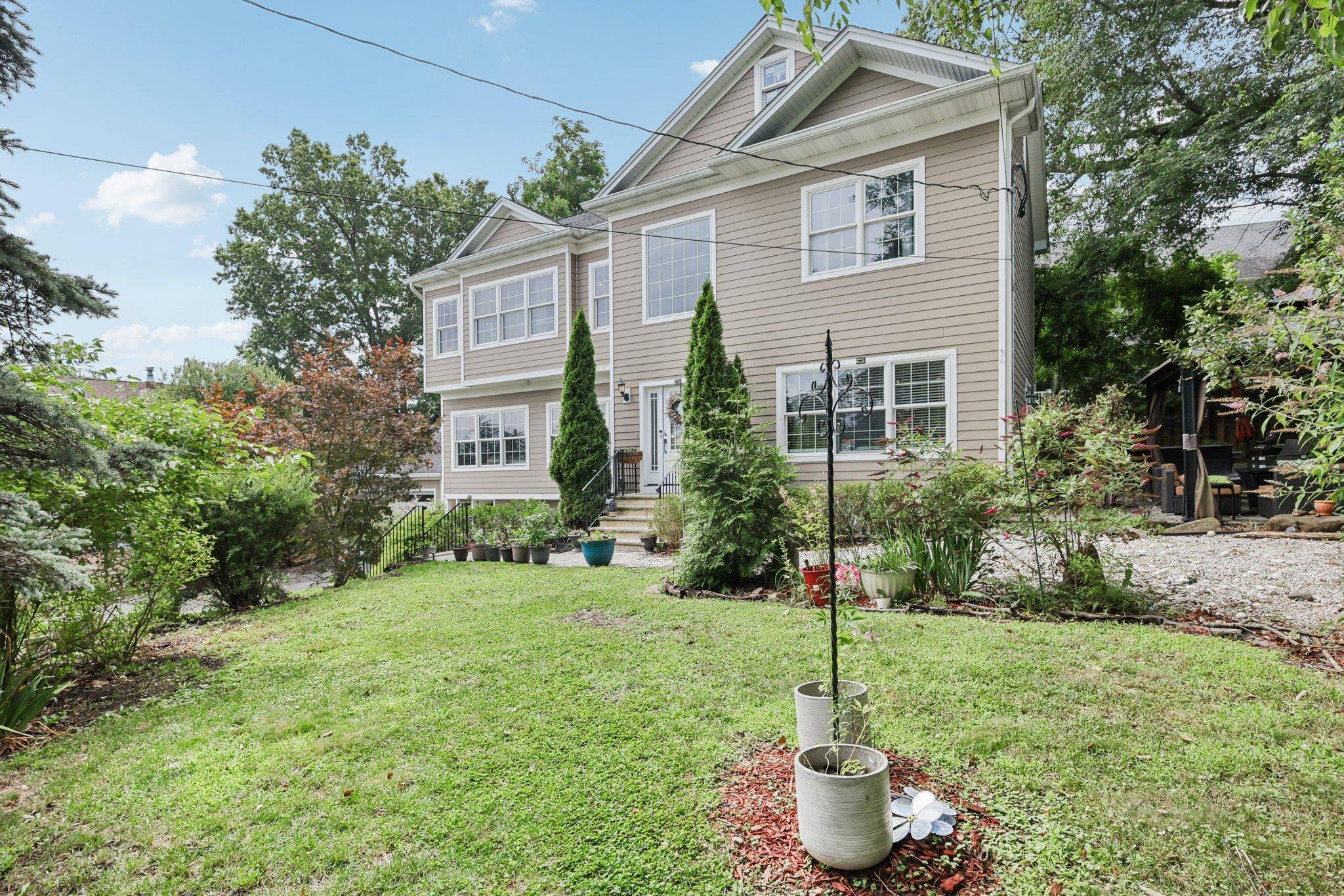 Welcome to 243 Birchwood Avenue where modern style meets the vibrant energy of Nyack, New York.