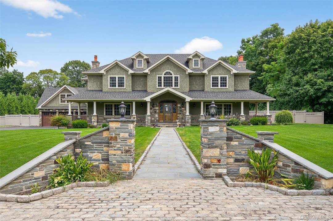 This spacious and versatile home offers exceptional living space across two thoughtfully designed levels, featuring 9 foot ceilings and wide plank hardwood floors throughout.