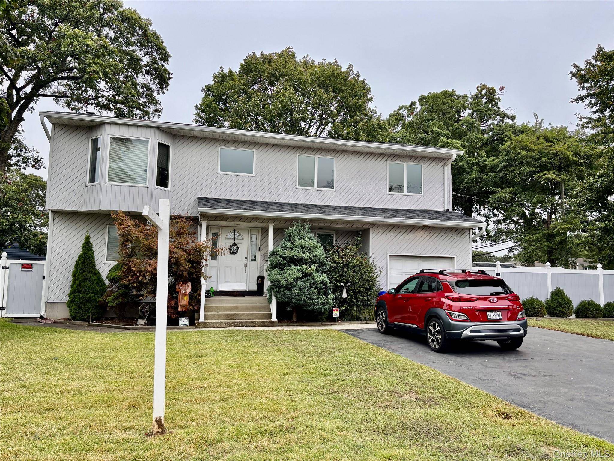 This is a lovely mother daughter home located in Massapequa.