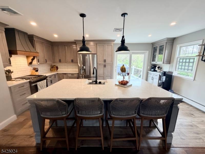 Welcome to a home designed to impress and entertain, inside and out.