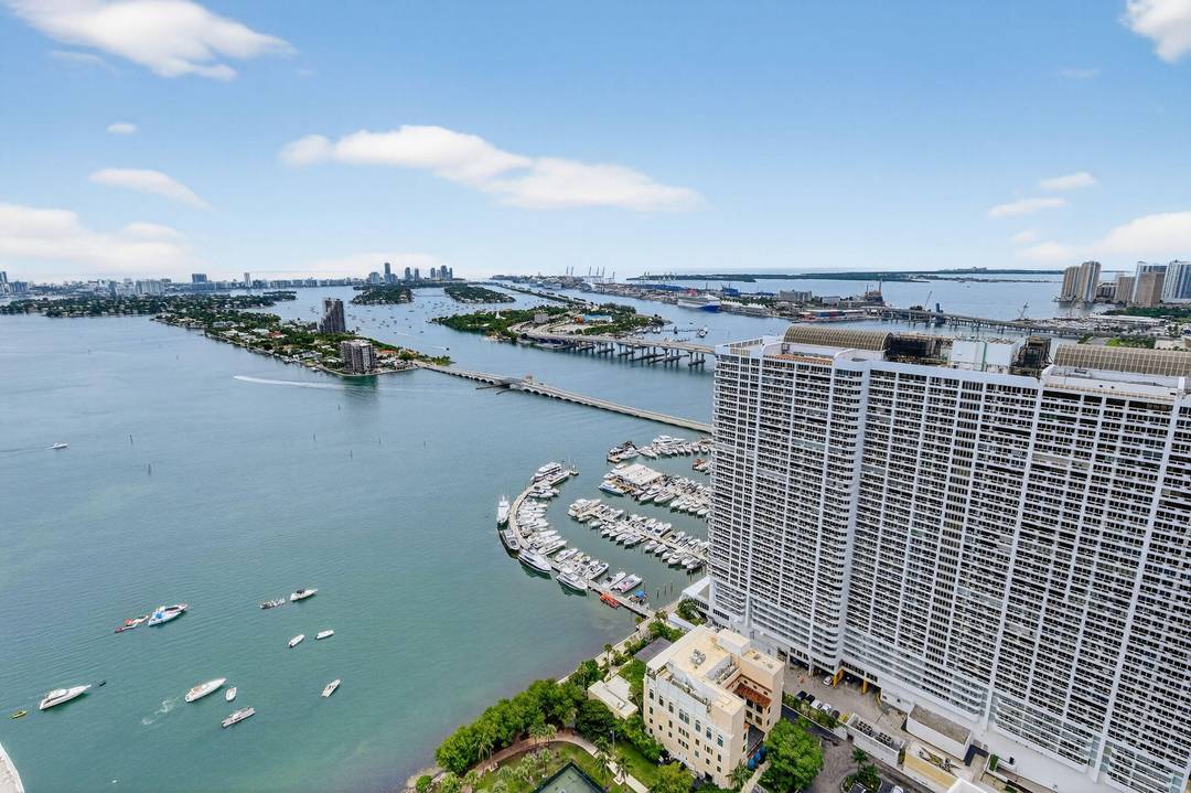 Stunning 46th floor residence at Aria on the Bay with sweeping panoramic views of Biscayne Bay, Miami Beach, and the downtown skyline.