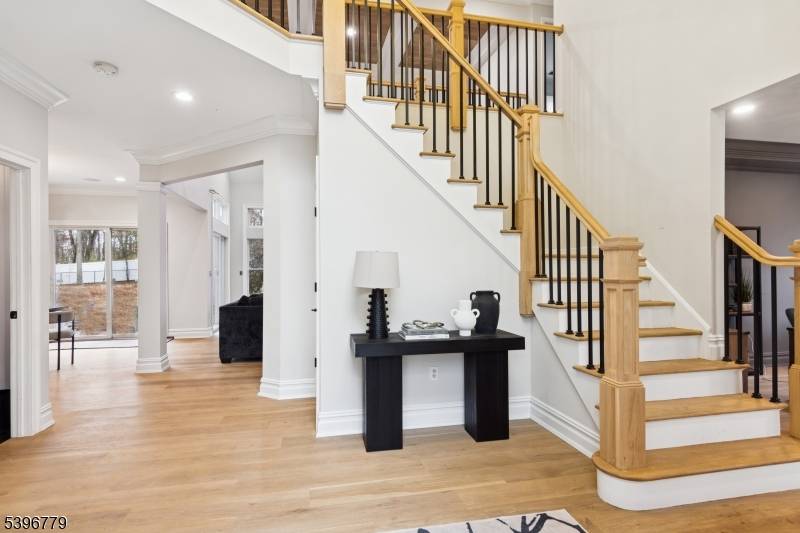 Welcome to 24 Denise Drive, an elegant custom colonial nestled in the prestigious Saw Mill Estates of Kinnelon.