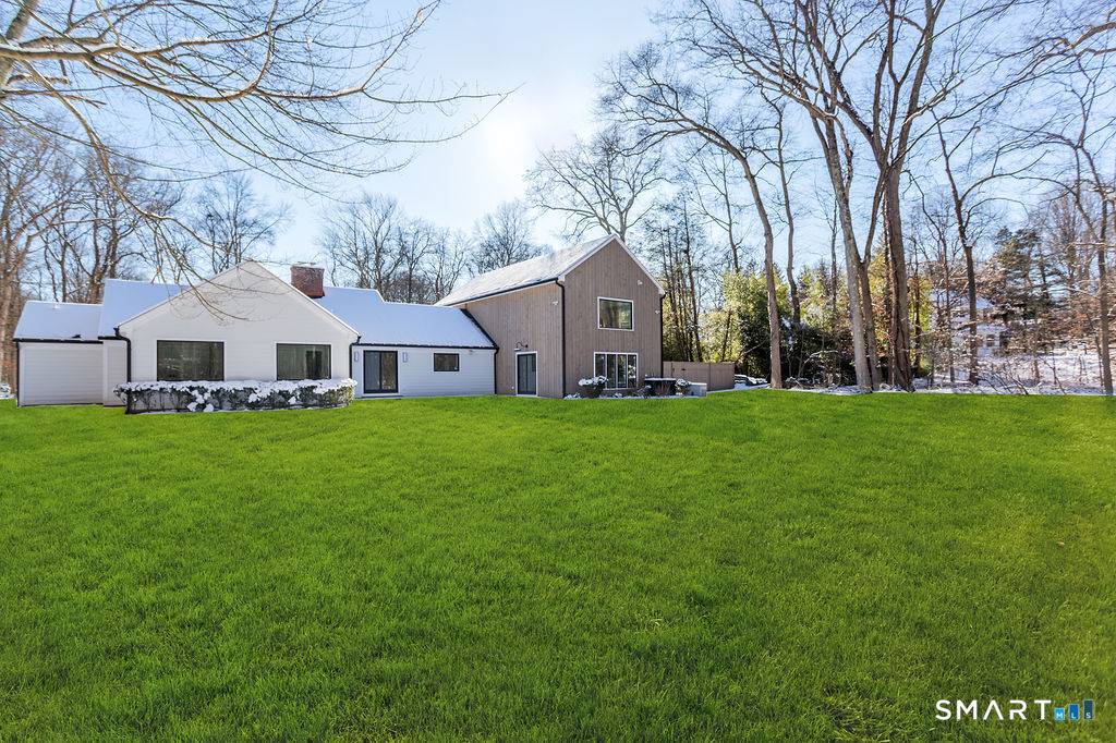 Fully renovated and expanded, this stunning 5 bedroom, 4.