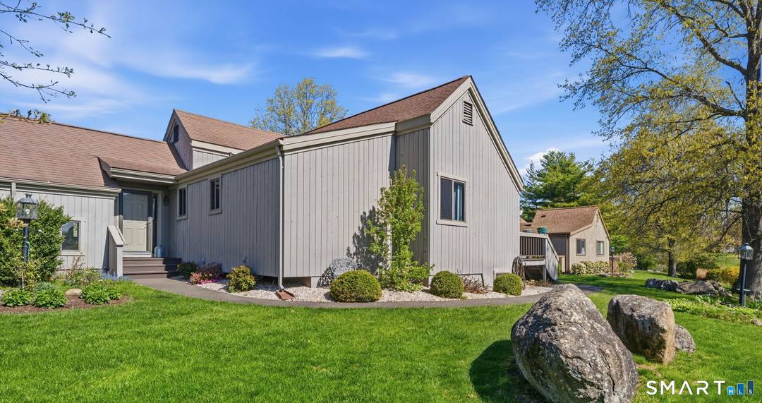 Experience the pinnacle of refined living in this rare, expanded Whittier nestled within the highly coveted Oronoque Village !