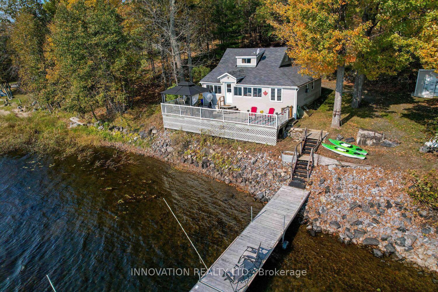 Dalhousie Lake Living ! Nestled privately at the end of Maple Hollow Drive, this charming and well maintained cottage offers the perfect lakeside retreat.