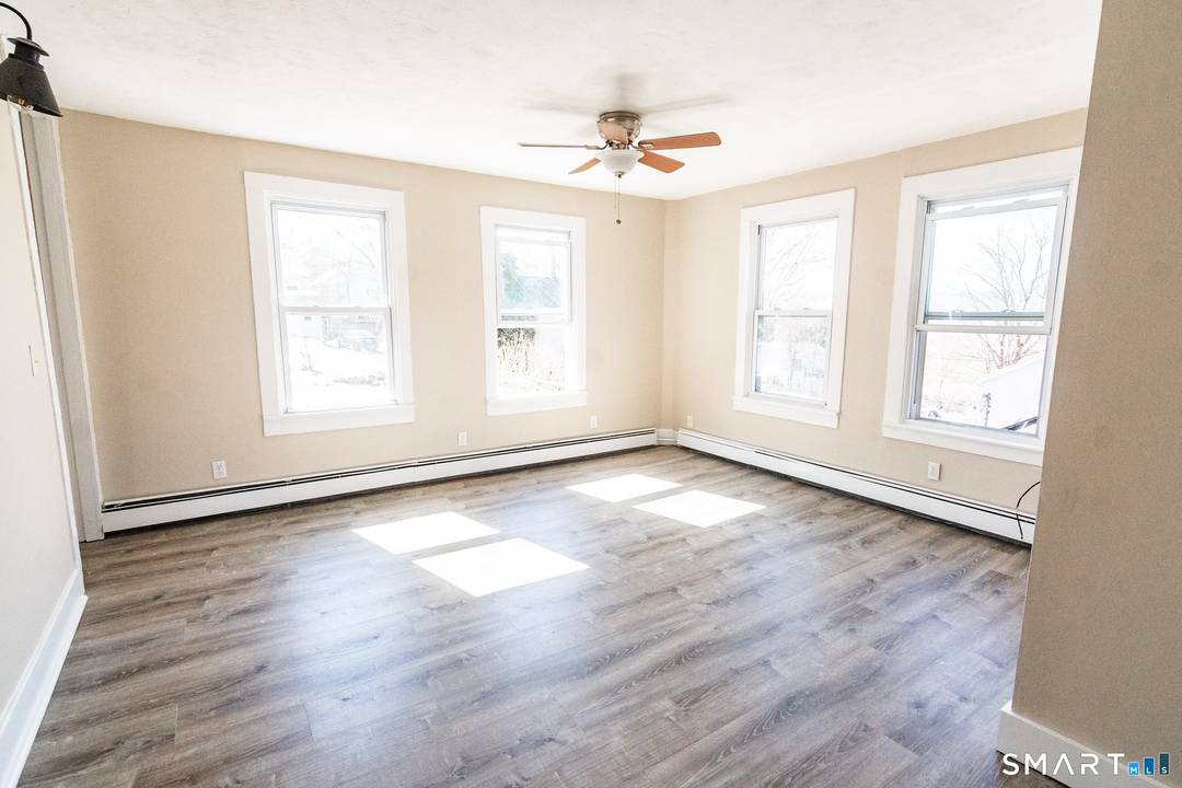 Discover this charming two family home in the heart of New Milford.