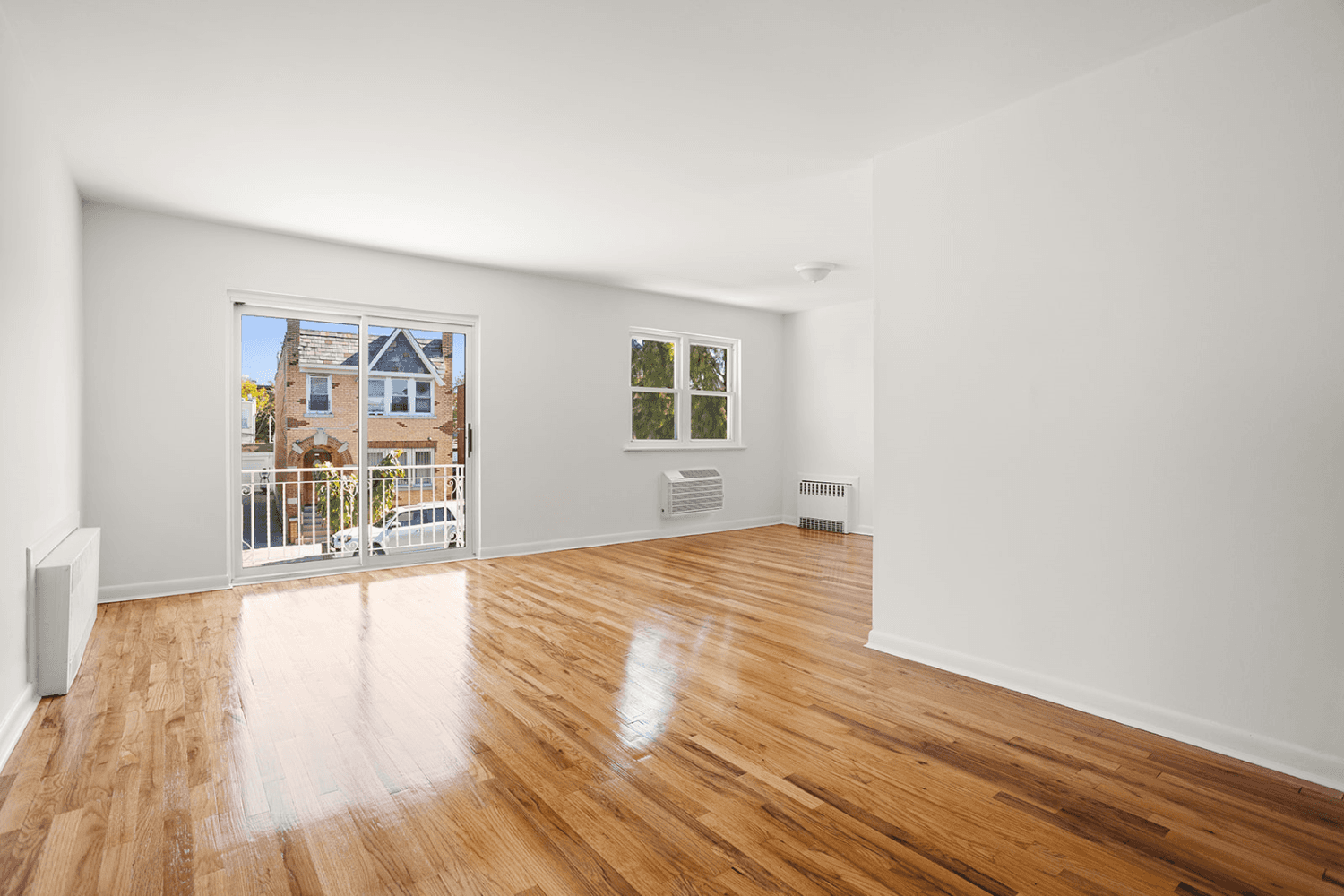 Welcome to 72 46 66th Place, situated on a quiet residential treelined street in Glendale, Queens.