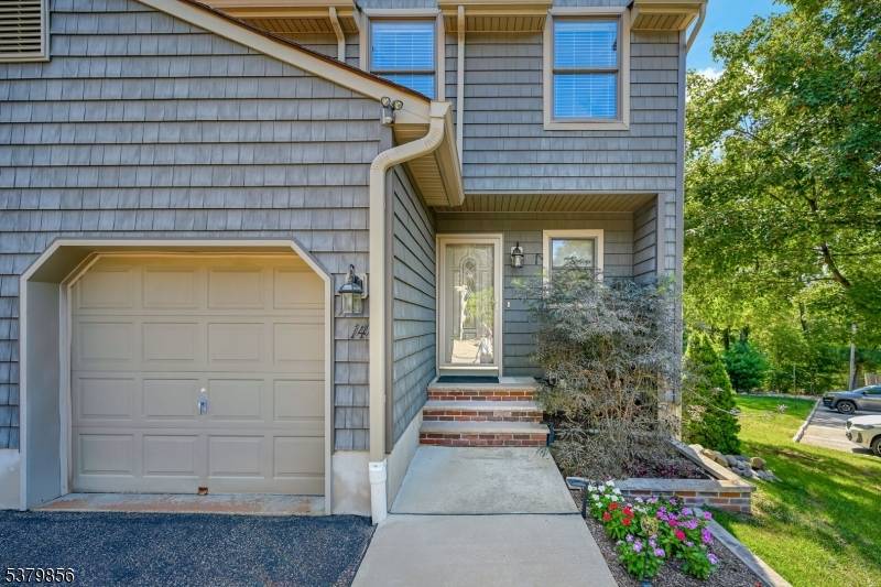 Super desirable, meticulously cared for, and sun drenched end unit with walkout basement in Mountain Ridge Townhomes !