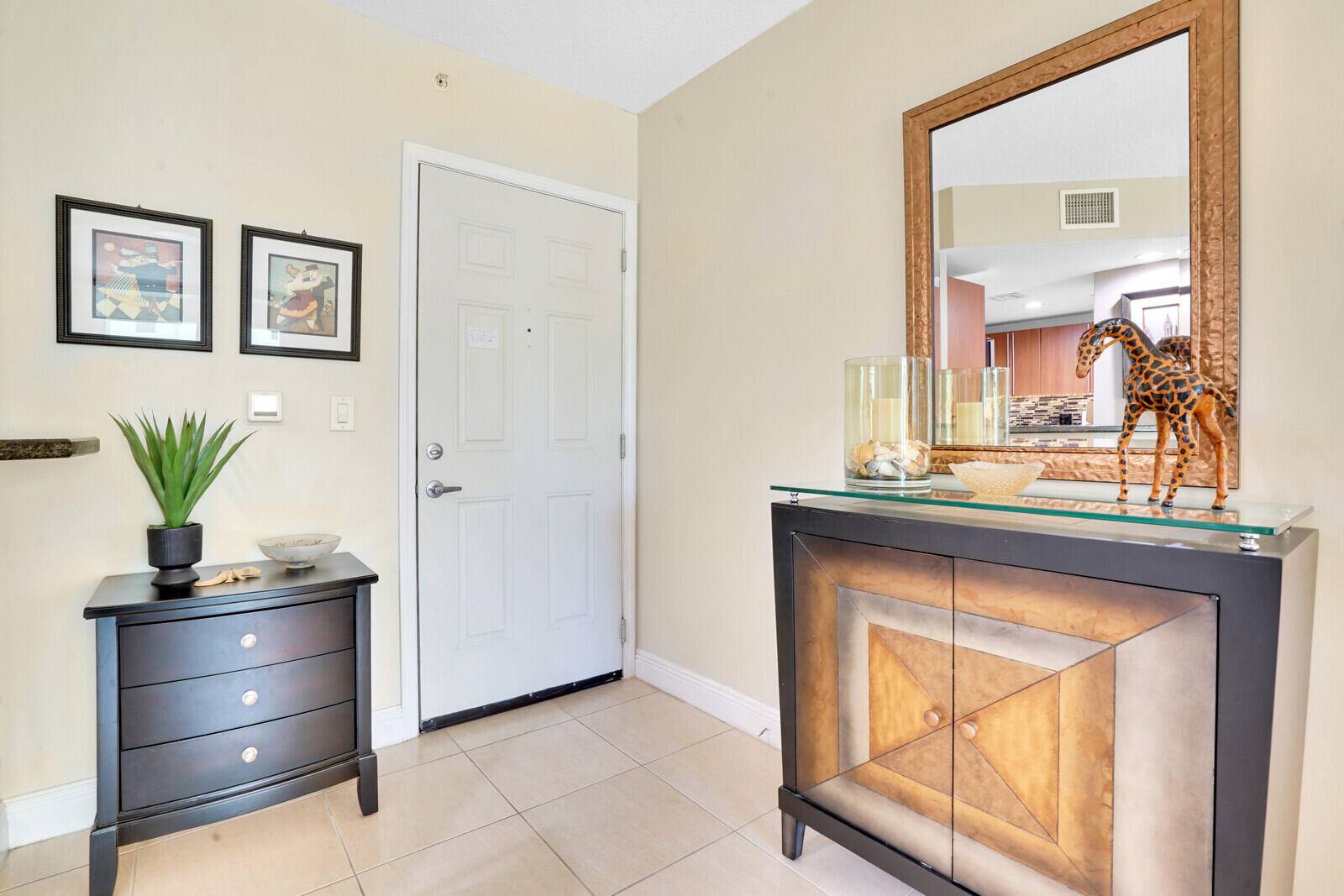 Stainless Steel Appliances, Granite counter tops, Italian cabinetry, a beautiful corner unit with covered balcony and open kitchen for entertaining, Full washer and dryer and very cozy and comfortable design.