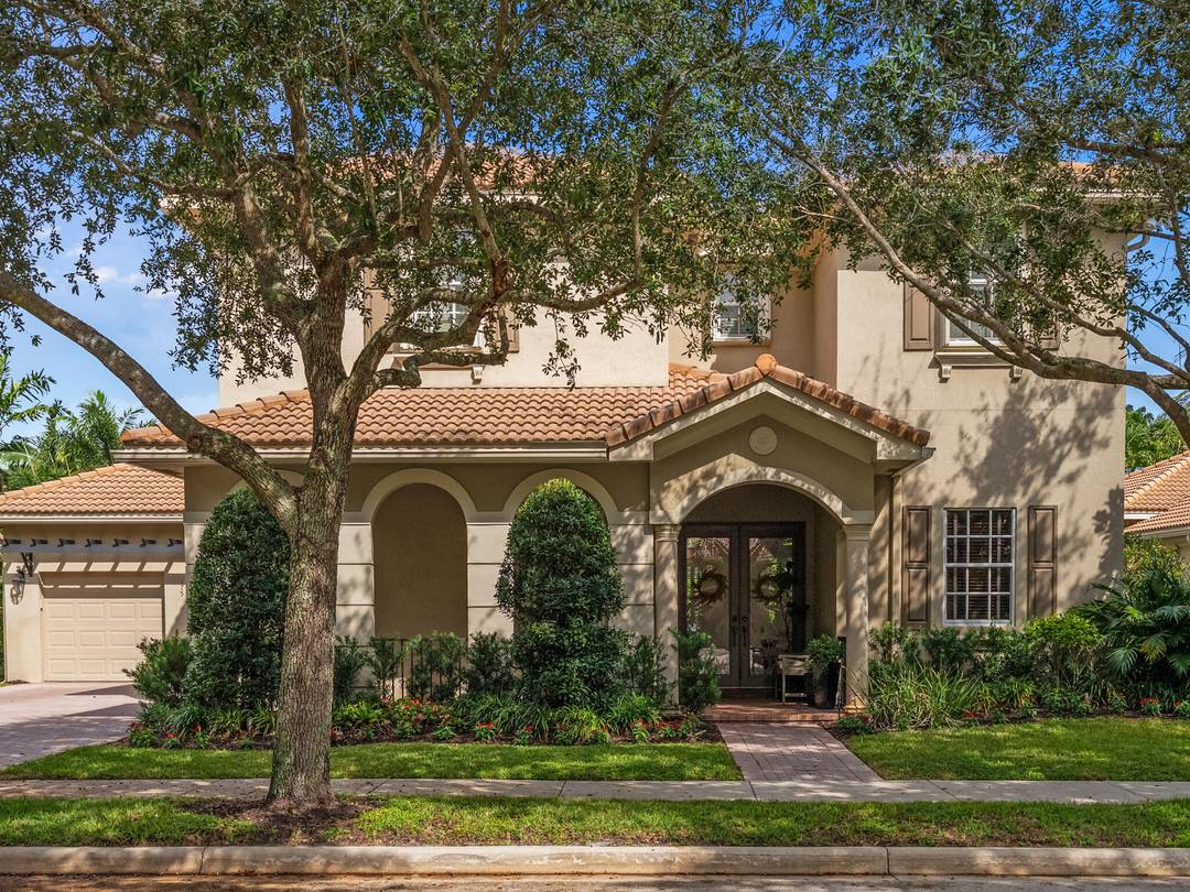Welcome to your South Florida paradise retreat WITH A BRAND NEW ROOF.