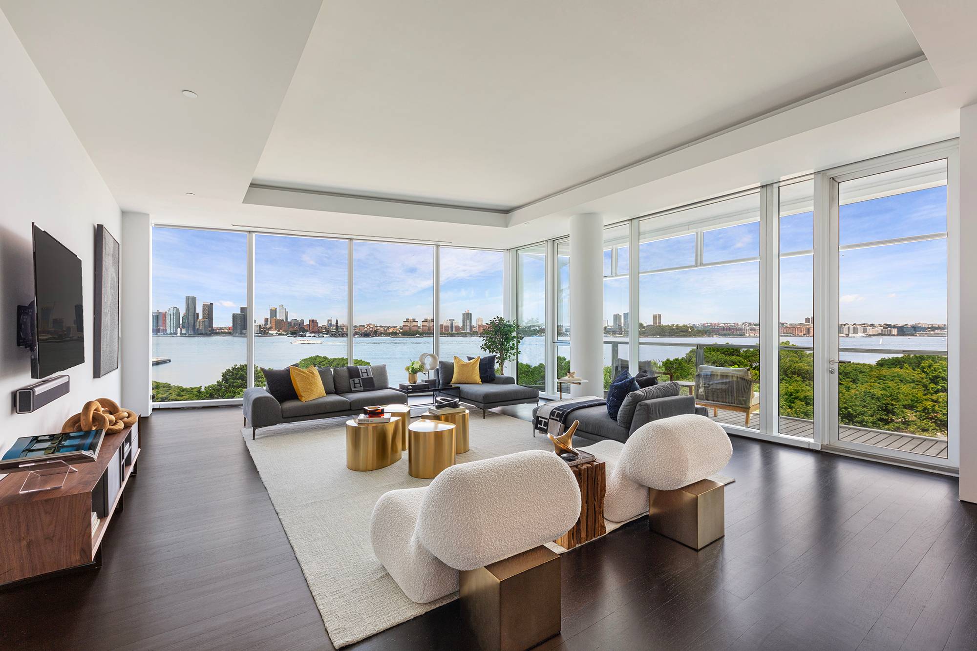 Impeccably designed and awash with natural light, this modern showplace in the luxurious Richard Meier condominium, 165 Charles, is a West Village dream residence.
