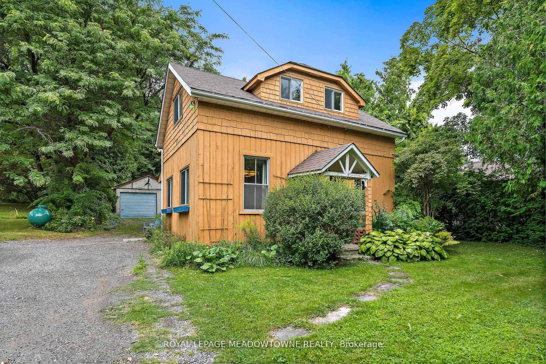 Charming character home in the quaint historic community of Limehouse on a pretty, mature and private.