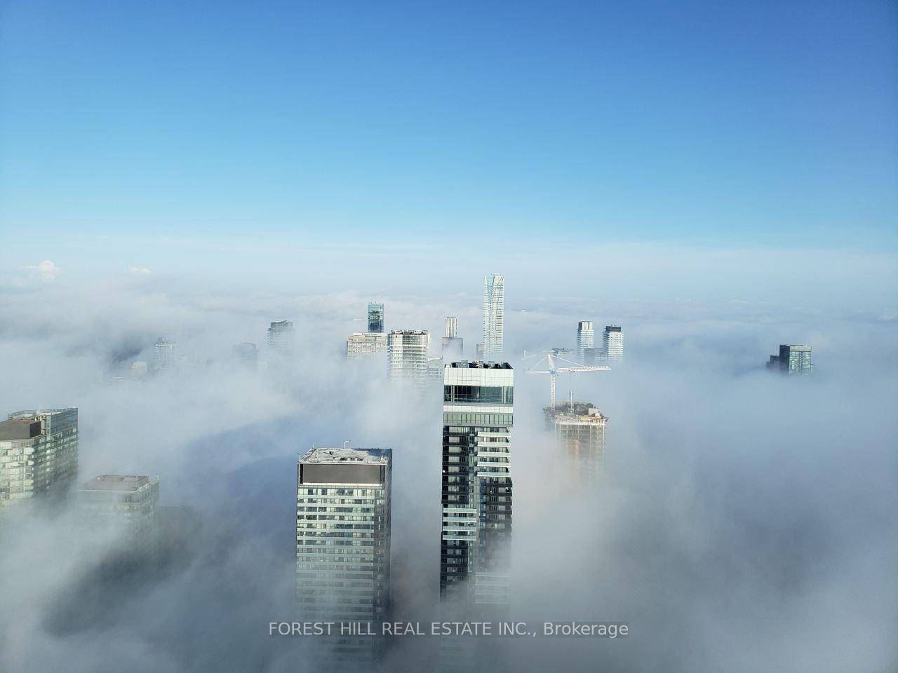 Experience Elevated Urban Living In This Stunning Executive 2 Bed 2 Bath Suite On The 74th Floor Of Aura Condominiums One Of Canada's Tallest And Most Prestigious Residential Towers.
