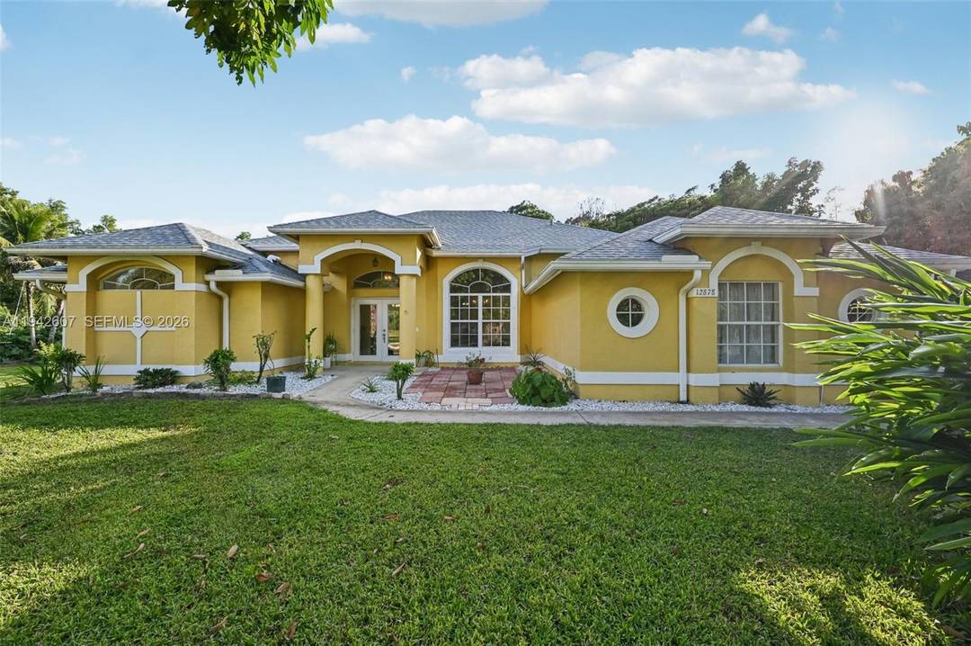 Welcome to this beautifully appointed 3 bed, 2 bath pool home on over 1.
