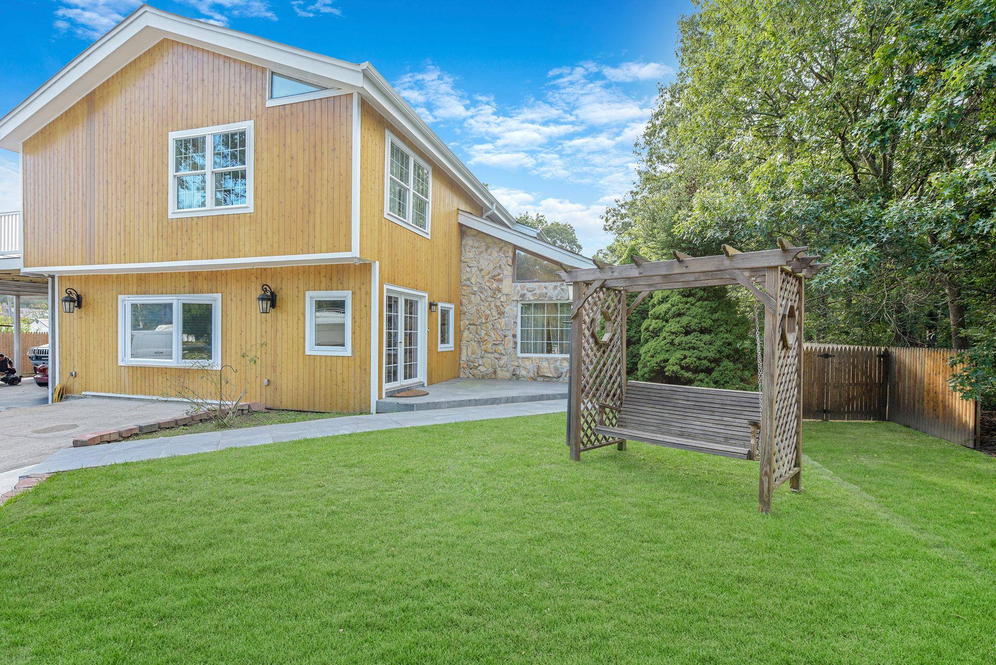 Enter onto the long driveway leading to this excitingly unique custom built home that sits on 1 Acre property.
