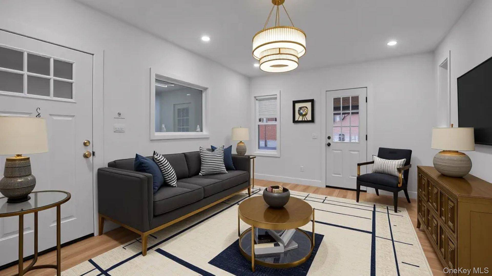 VIRTUAL STAGING, NOT REAL PROPERTY PHOTOS Welcome to 679 E 221st Street, a spacious two family home located in the heart of Olinville.