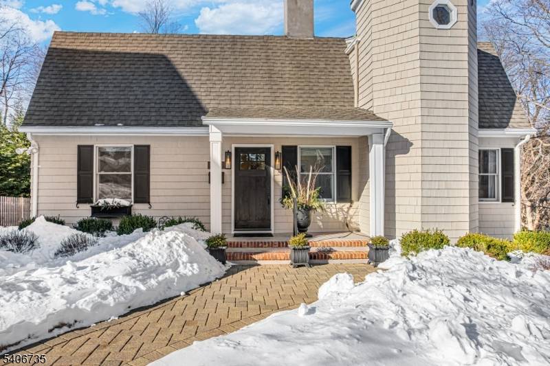 Discover an exceptional custom home tucked away on a quiet cul de sac in a desirable neighborhood set on nearly half an acre in historical Washington's Headquarters, where inspired design, ...