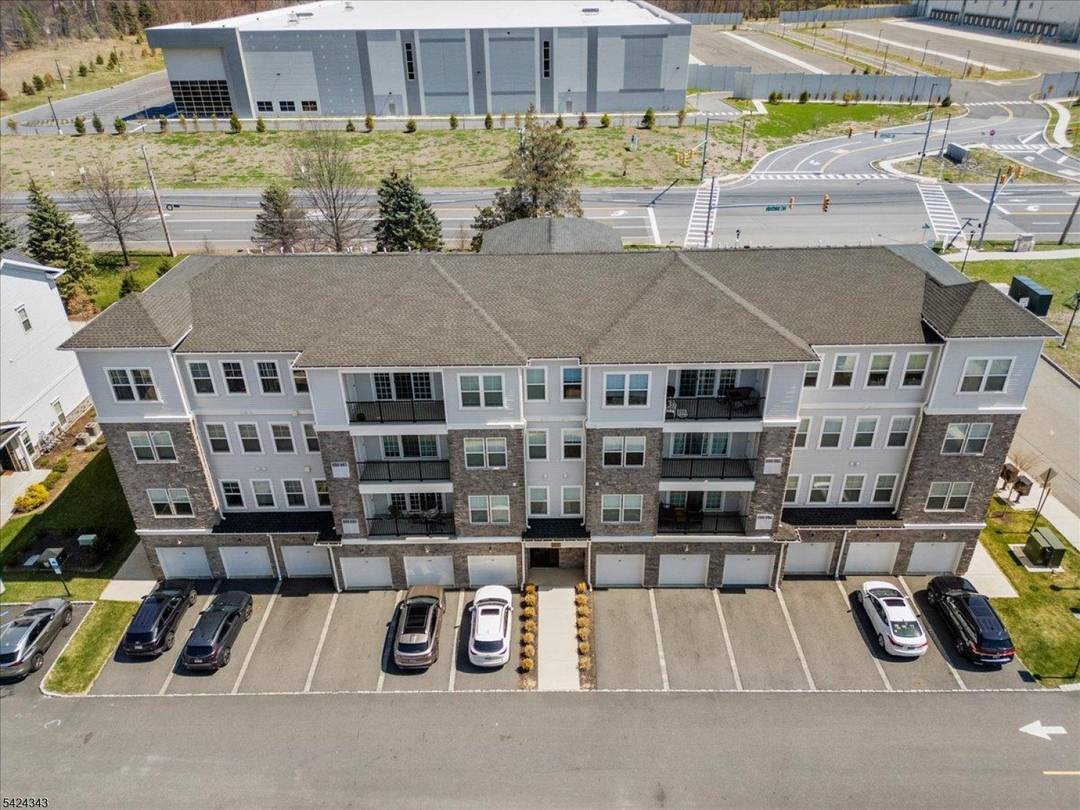 Welcome to this exceptional 3 bedroom, 2 bath in the highly sought after Collection at Morris Plains, where contemporary style meets everyday comfort.