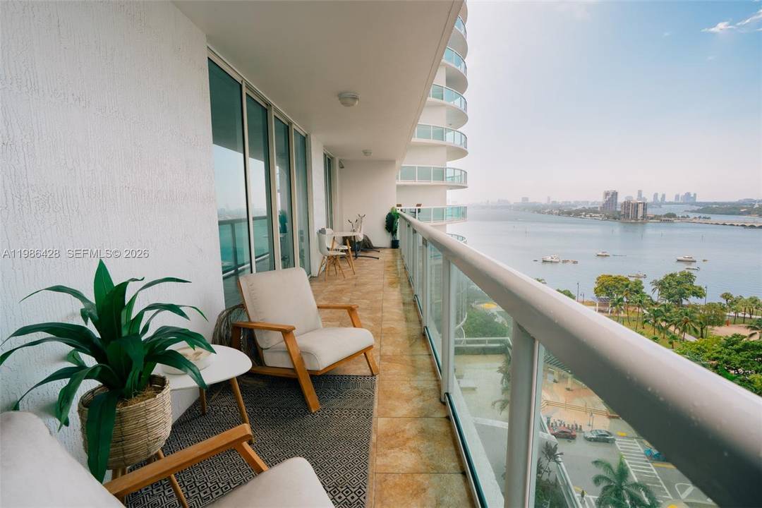 Wake up to stunning Biscayne Bay views in this 2 bedroom, 2 bath split plan condo in the heart of Edgewater.