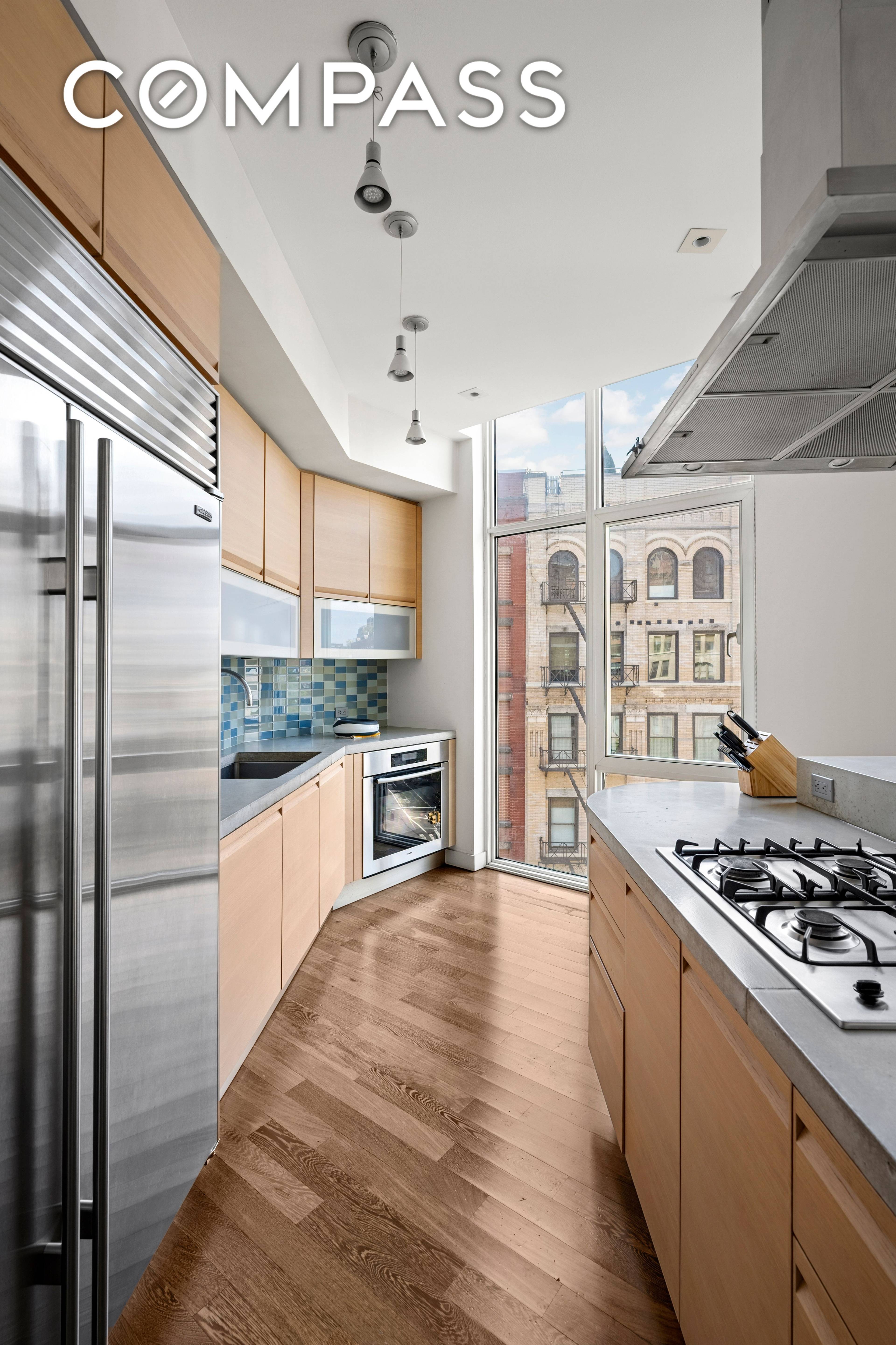 Nestled in North Tribeca s coveted Zinc Building, this 3 bedroom, 2.