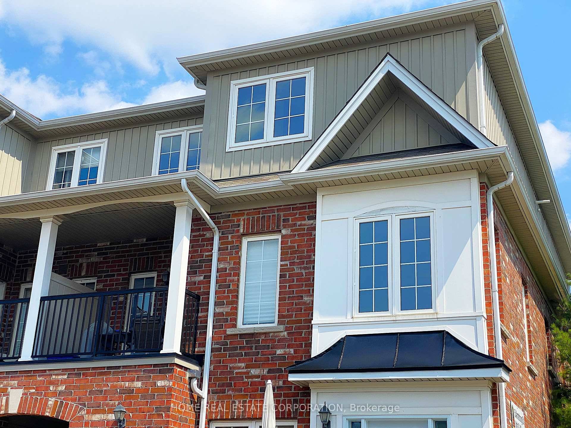 Great Price for this End Unit Rockefeller unit with private, owned parking directly in front.