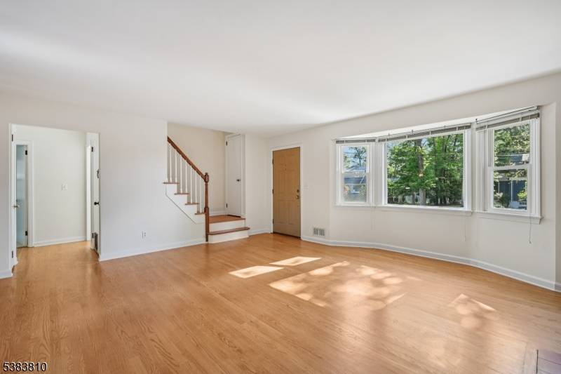Move In Ready Cape in desirable Packanack Lake section of Wayne, with member privileges to the lake and recreational facilities.
