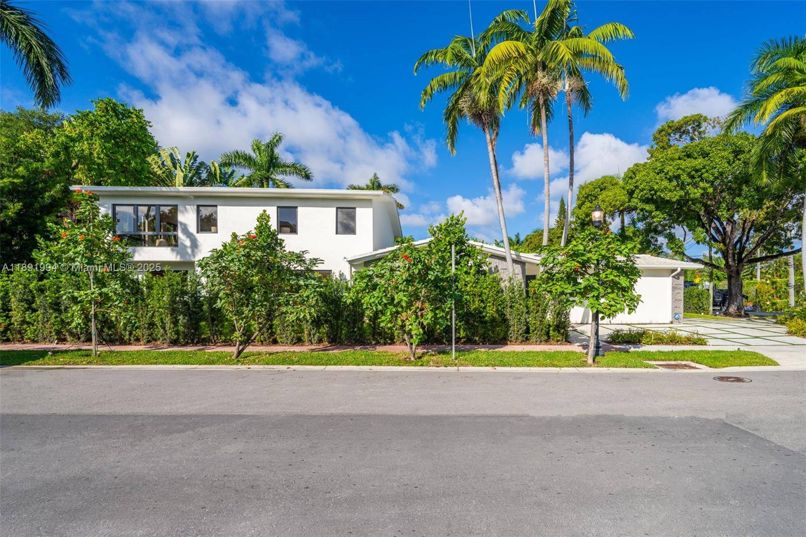 Exquisite home on a coveted corner lot on Rivo Alto in the Venetian Islands, fully reimagined in 2025 for organic modern living.