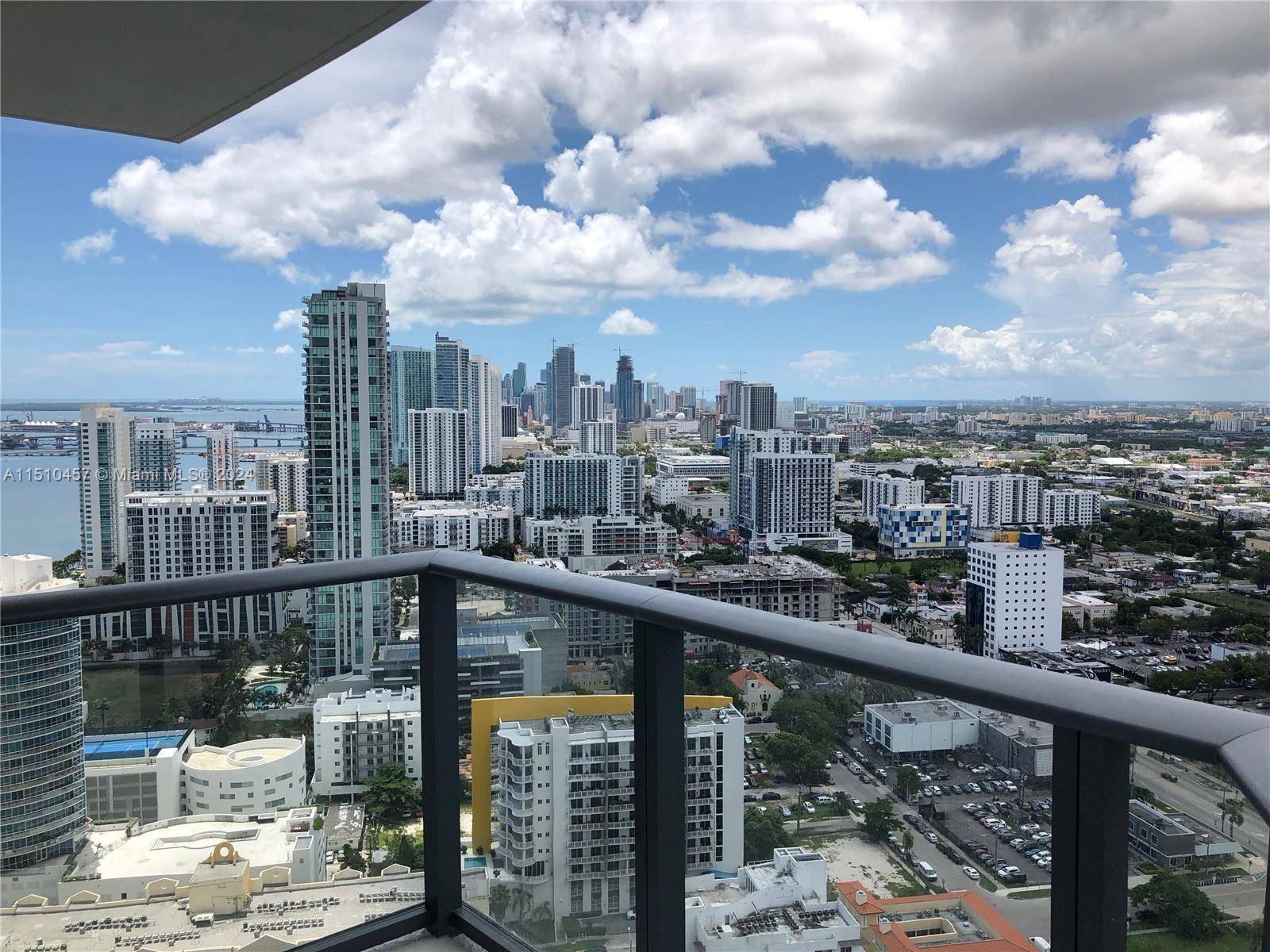 This spectacular unit is located in the new Paraiso Bayviews, designed by the award winning Karim Rashid.