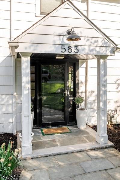Prim, proper and perfect Upper Montclair colonial on stately Highland Avenue.