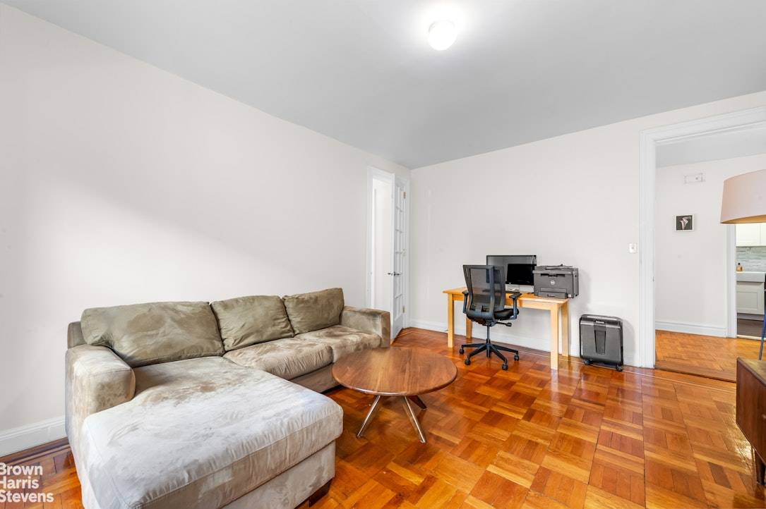 Welcome to this spacious three bedroom apartment located on a charming tree lined street in a stunning prewar building.