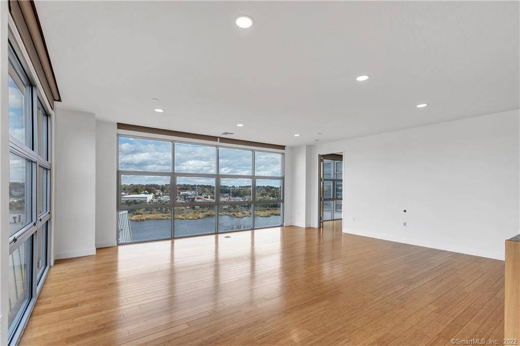 WATERFRONT CORNER UNIT, FIRST ONE OFFERED IN 10 YEARS !