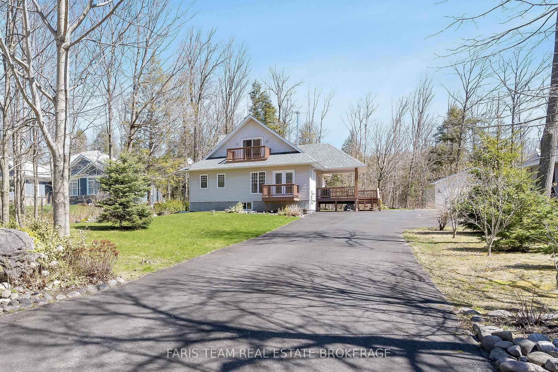 Top 5 Reasons You Will Love This Home 1 Impeccably maintained retreat, complete with a fully paved driveway, a covered deck, and an expansive open living area with a comforting ...