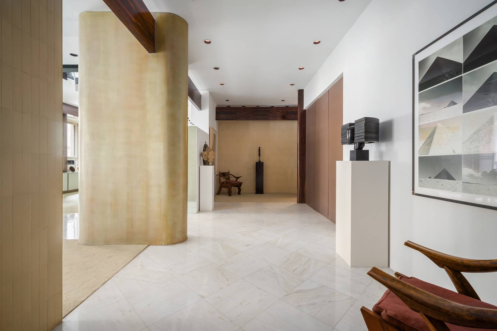 Enjoy downtown living on Park Avenue in this ten into eight room residence in one of the Upper East Side s most prestigious and sought after cooperatives.