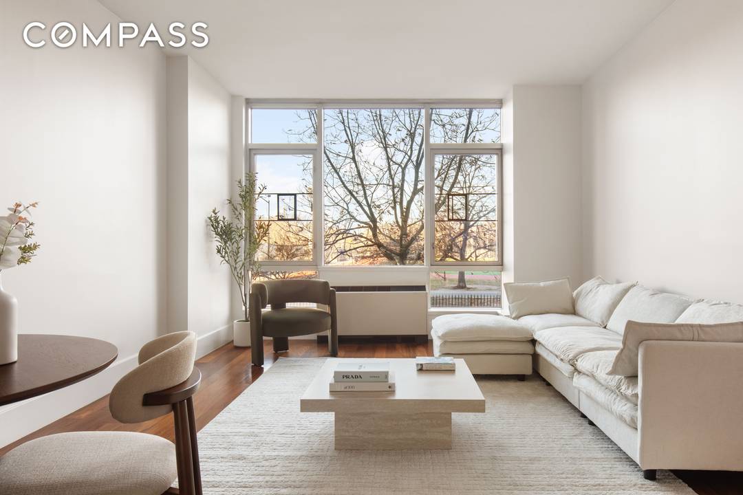 Welcome to Residence 2A at 30 Bayard Street, a sophisticated, park front home perfectly positioned directly across from McCarren Park in the heart of prime Williamsburg.