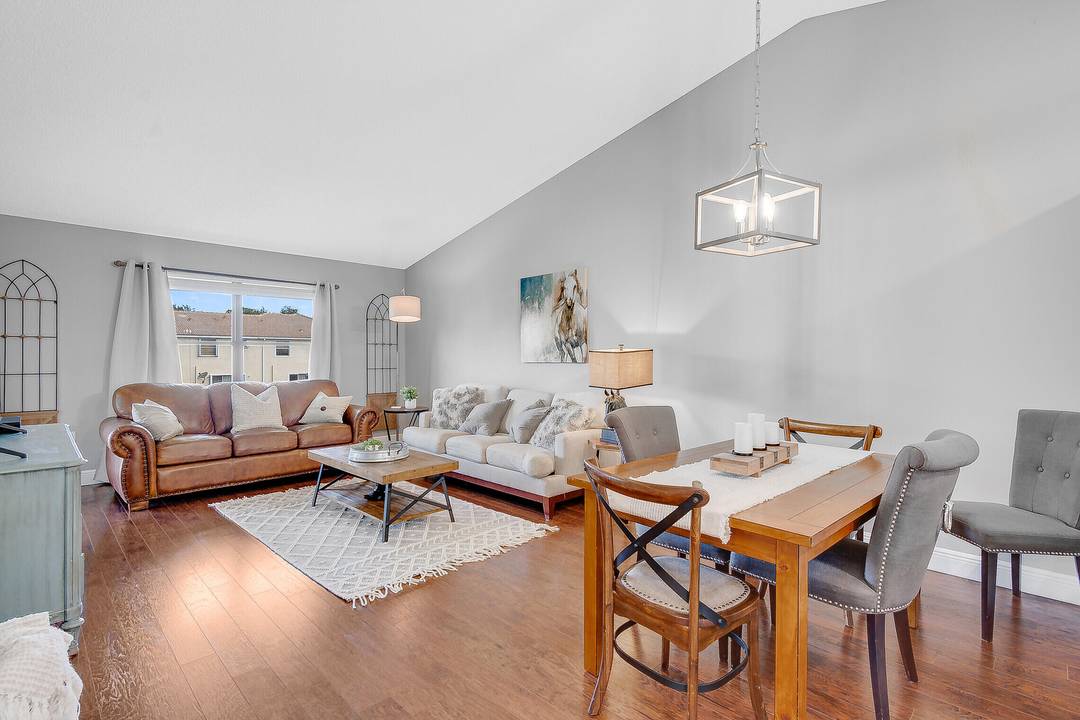 Experience the epitome of luxury in this stunning, turnkey second floor condo featuring an expansive open concept living space.