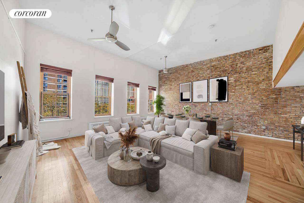 Welcome to this gracious downtown loft, perched on the top floor of a historic prewar elevator building.