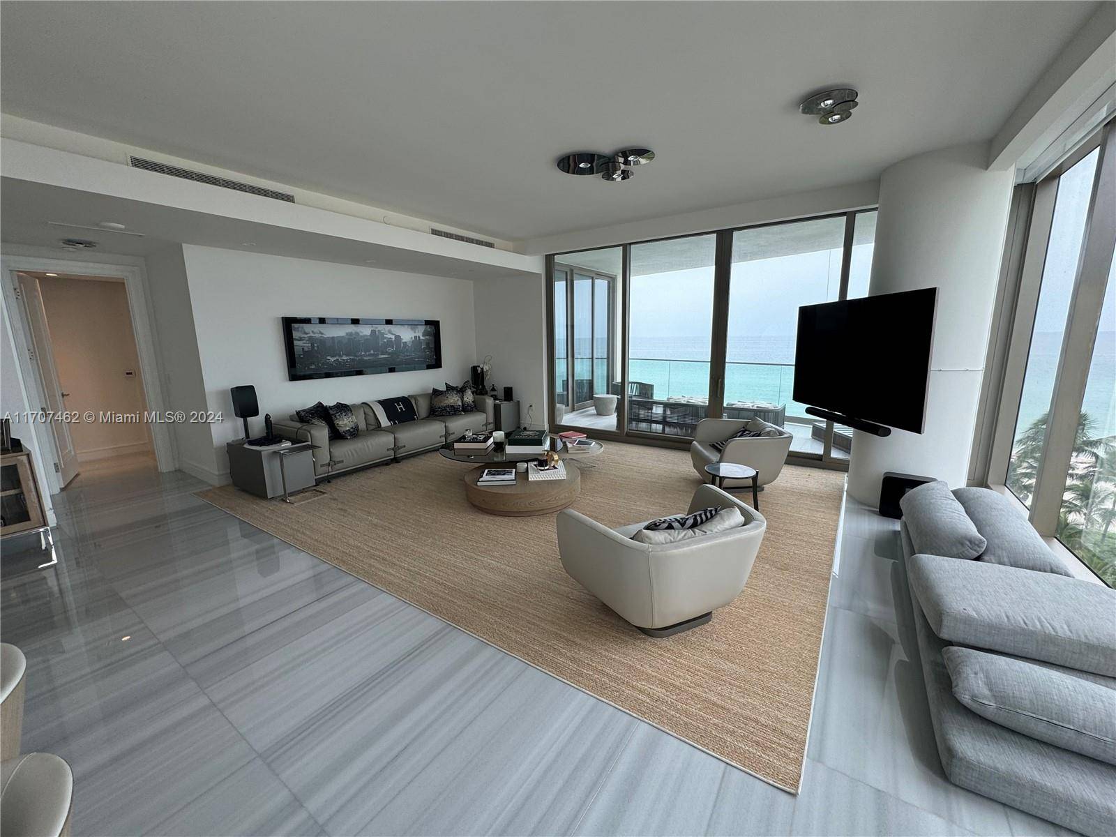 4 BEDROOMS CONV DEN TO 5 BEDROOM, A RARE CUSTOMIZED DONATELLO 4131 SQFT, SE CORNER LIVES LIKE A SINGLE FAMILY HOME, HEAR AND SEE THE OCEAN AND BEACH.
