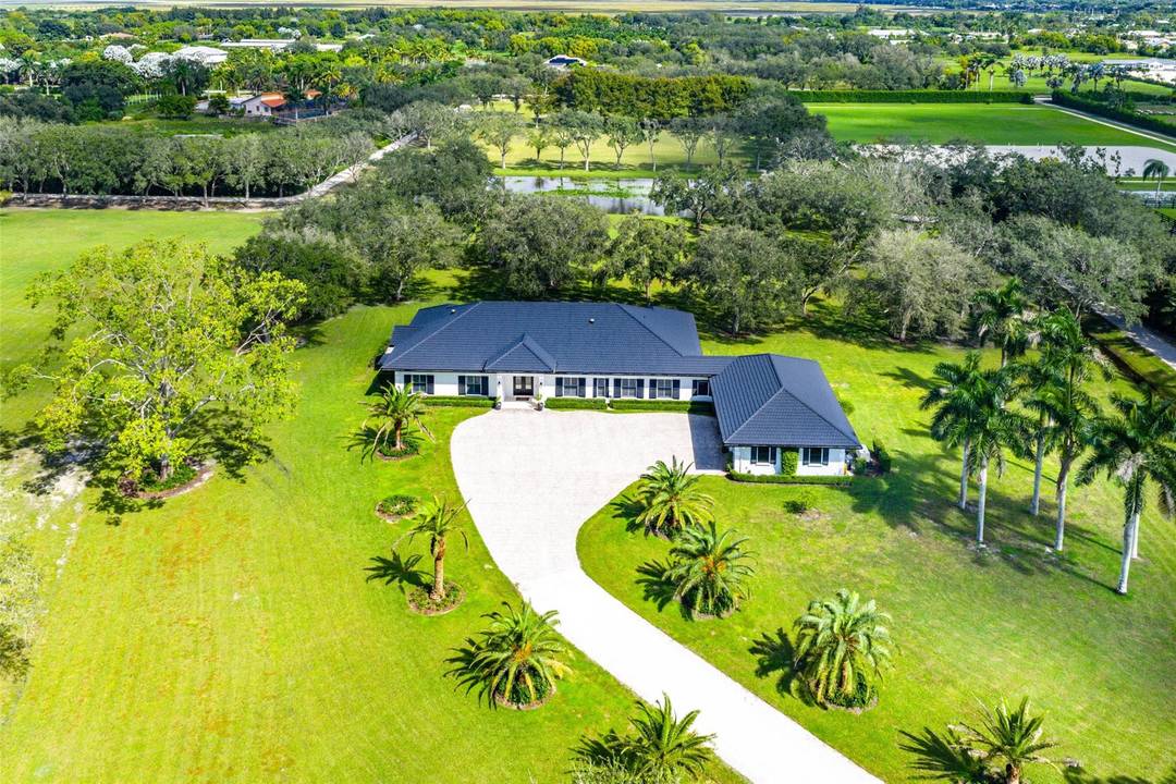 A rare 14 acre equestrian estate in Wellington, Florida, located in the prestigious Rustic Ranches Estates.