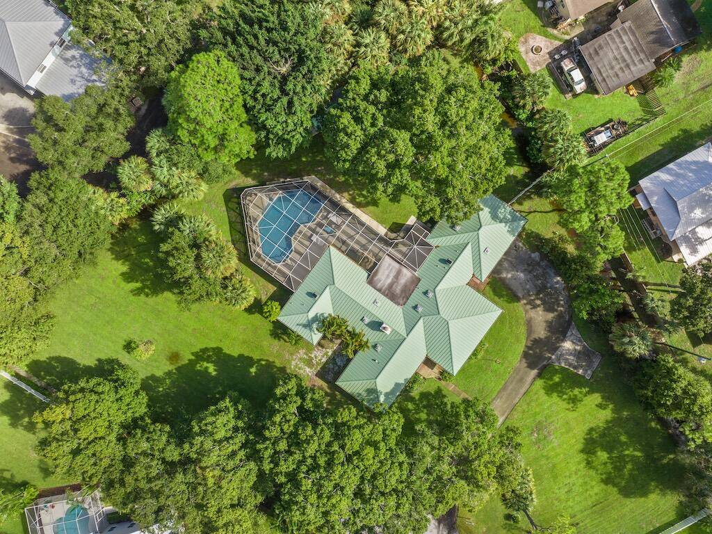 Welcome to your private Vero Beach sanctuary, a beautifully updated 4 bedroom, 2.