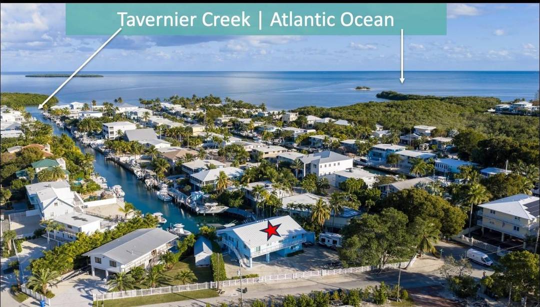 Experience the best of The Florida Keys waterfront living in this thoughtfully recently remodeled 3 bed, 2 bath solid concrete home, including a convenient downstairs bedroom, located just off Tavernier ...