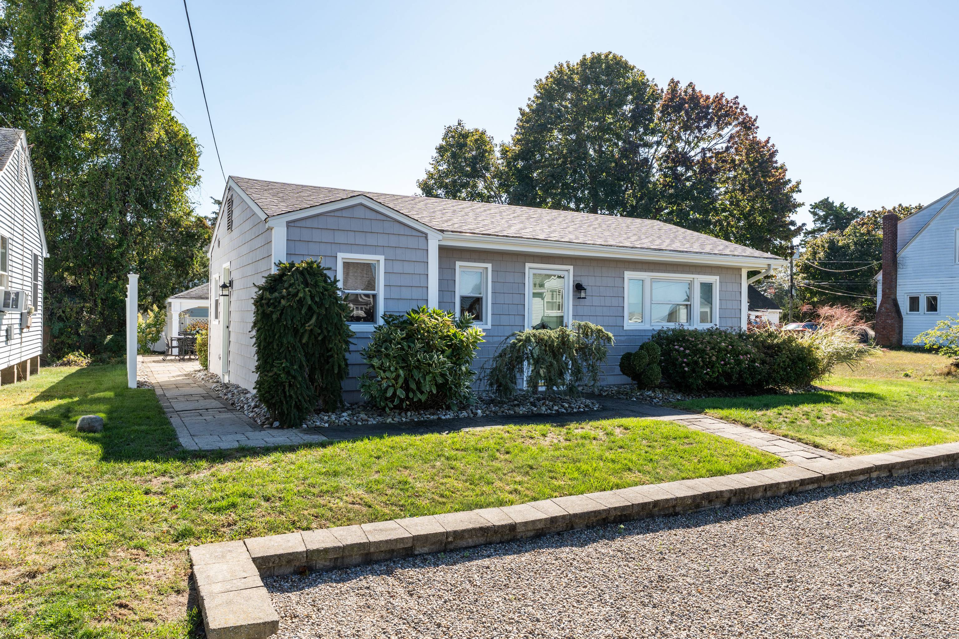 Charming and completely turn key, this year round Harborview beach house is your little piece of perfect !