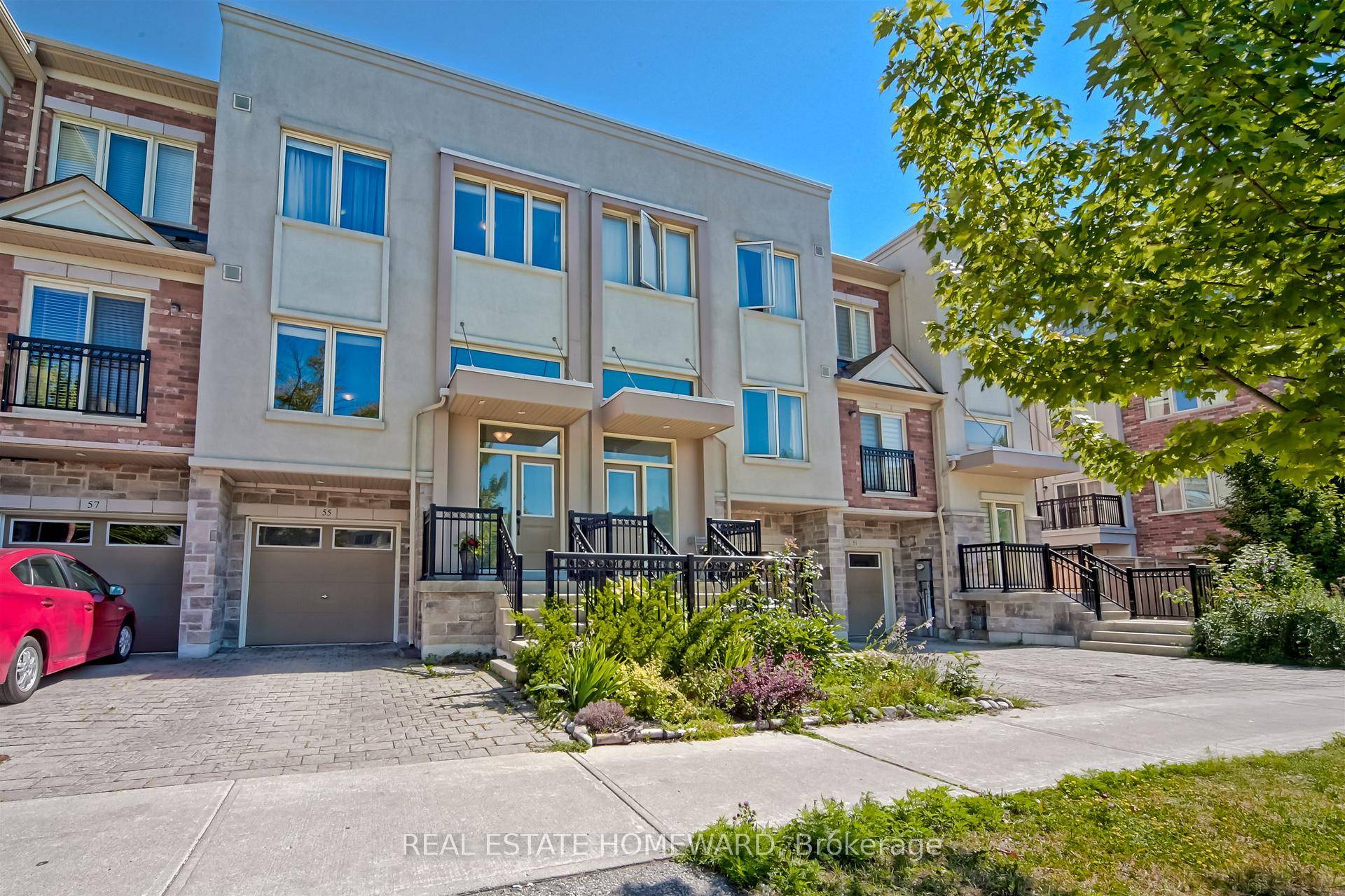 Welcome to this beautifully maintained freehold townhouse built by renowned builder Menkes, located in the heart of North York.